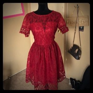 Deep red dress with embroidery